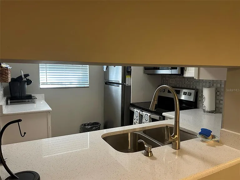 5662 Gardens Dr #104 — Photo 10