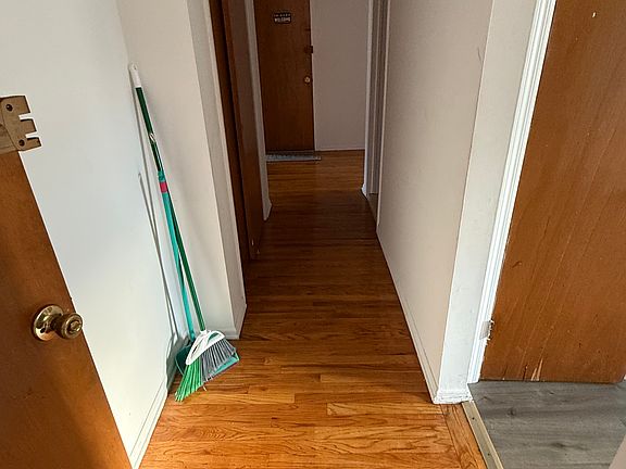 Hallway with coat closet