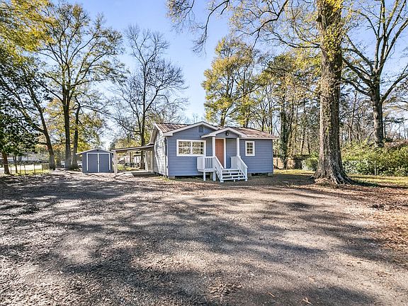 Front Exterior - Large Fenced In Corner Lot