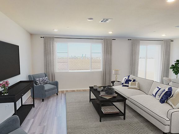 Residence 2 great room modeled at a nearby Meritage community.