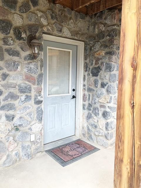 Walk-out entry at the back of the house.