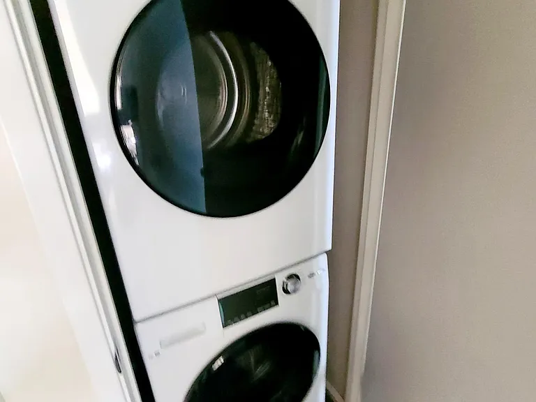 New stacked washer/dryer in unit