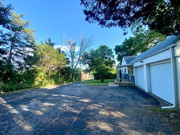 Lots of privacy and large driveway for parking.