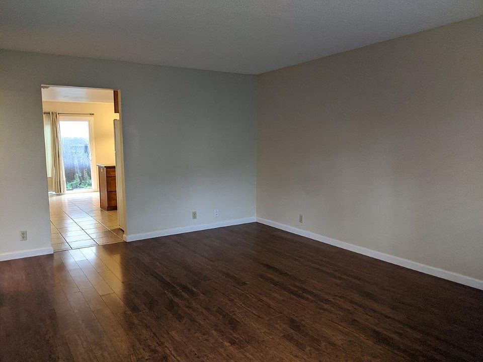 Living Room from entry way looking into Kitchen/dining/patio