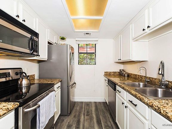 2nd image of 12083 Alta Carmel Ct Unit 32