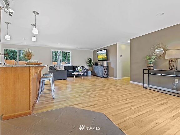 Walk in the front door to a light and bright, open concept living space.