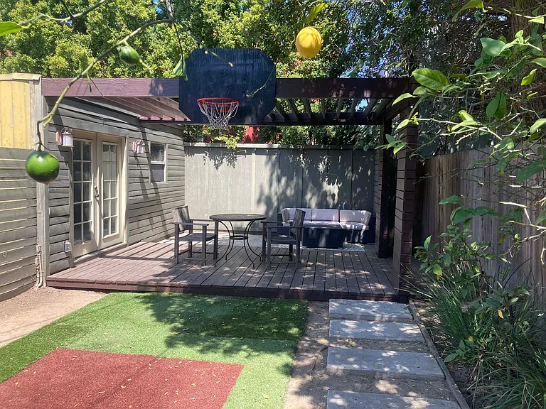 Private backyard with separate Storage/Studio space