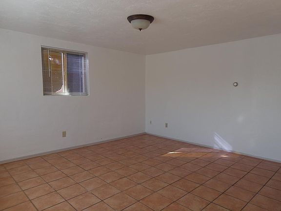 Living room, tile and fresh paint throughout