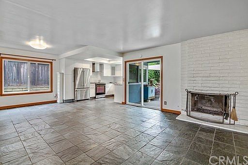 Family Room and Eating area. Fireplace and access to the backyard.