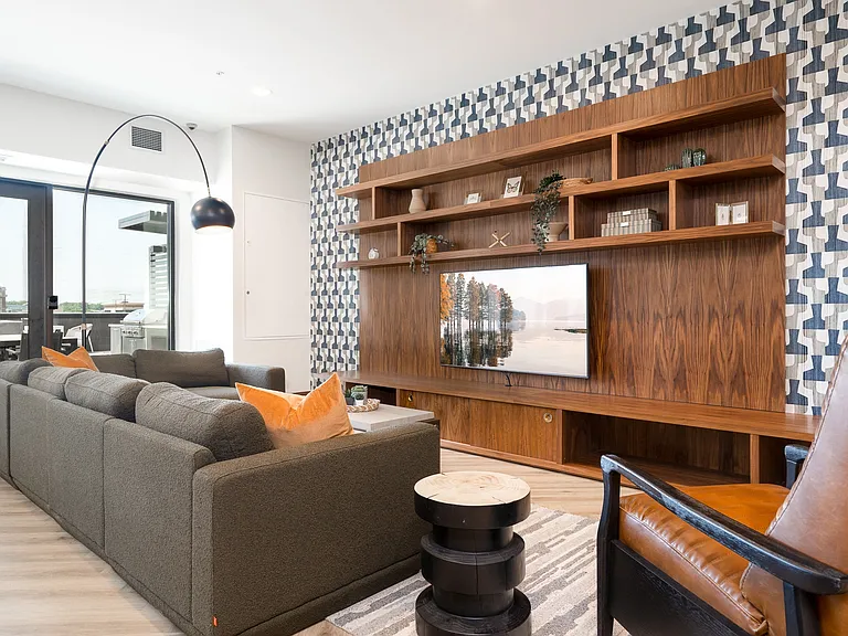 Gather with friends or relax in our inviting entertainment suite, featuring abundant natural light.