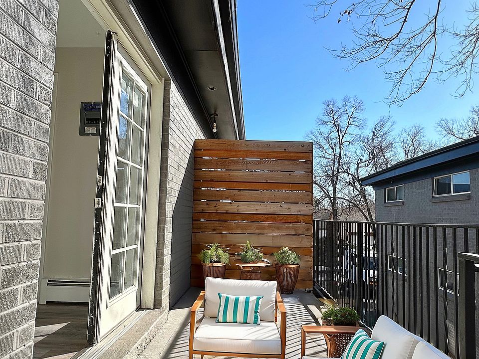Experience city living with this elegant balcony, perfect for relaxation and entertainment.