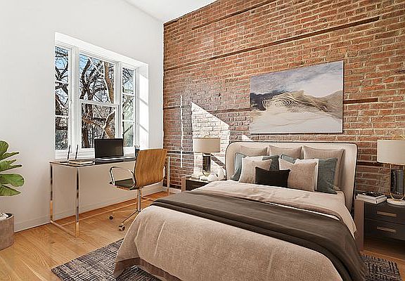2nd image of 301 E 10th St APT 3