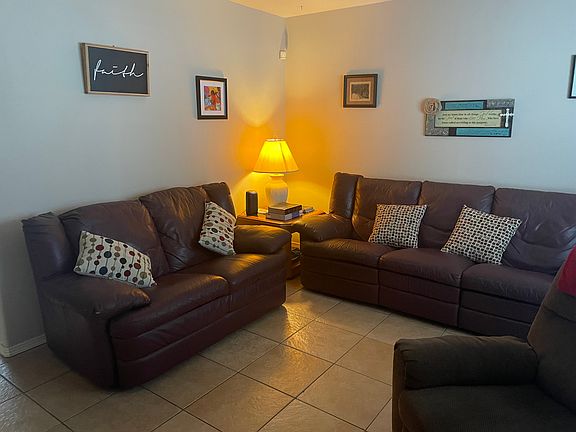 Living Room with reclining 3 seat sofa