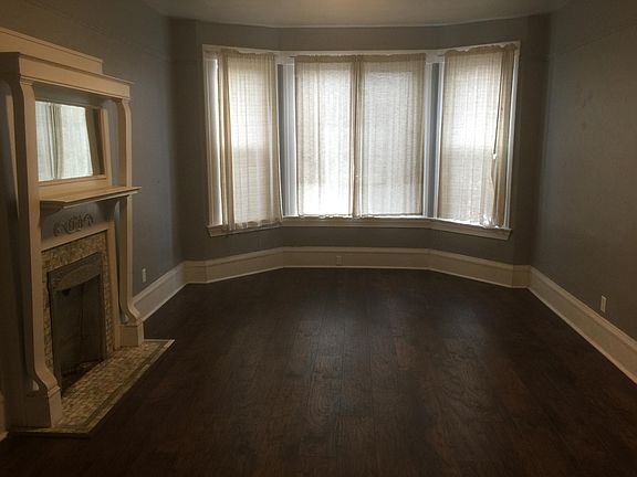 Living Room with Decorative Fireplace