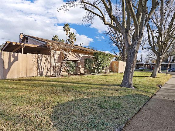 4th image of 6107 N Harrisburg Pl
