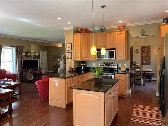 Open floorplan with the kitchen at the heart of the first floor.  Lots of cabinetry.  Breakfast nook, formal dining room.