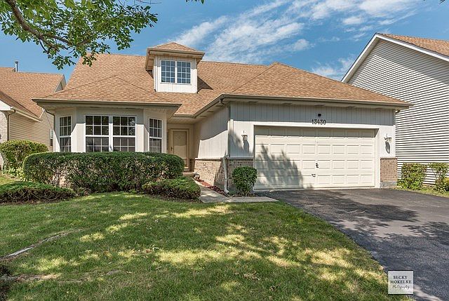 Front view - 2 car attached garage