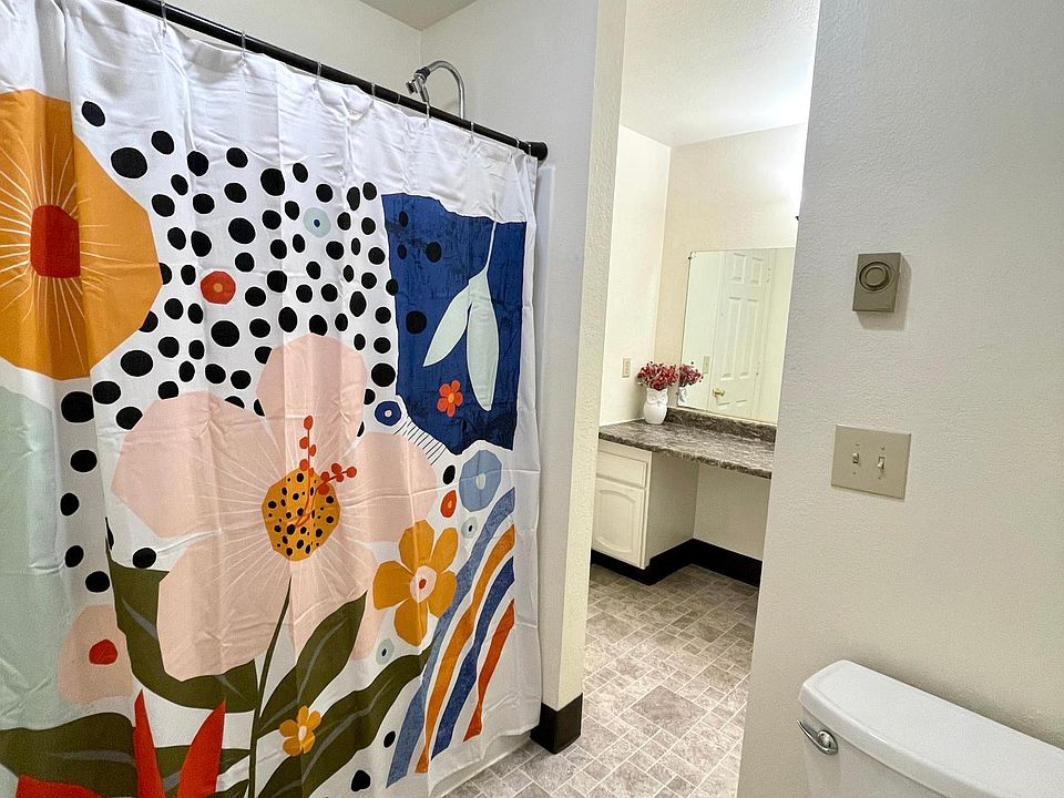Huge bathroom. Shower and toilet are separate from sink.