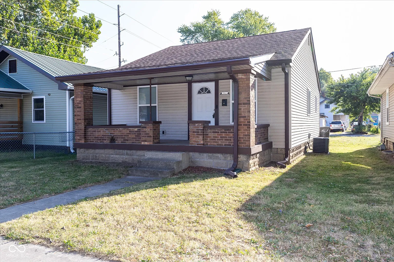 1167 N Warman Ave photo 1