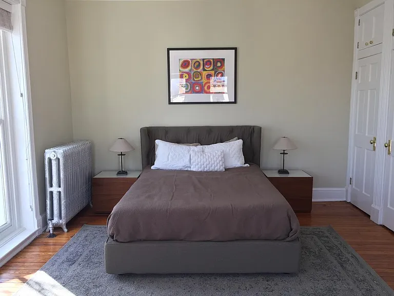 Huge bedroom with queen bed and lots of closets