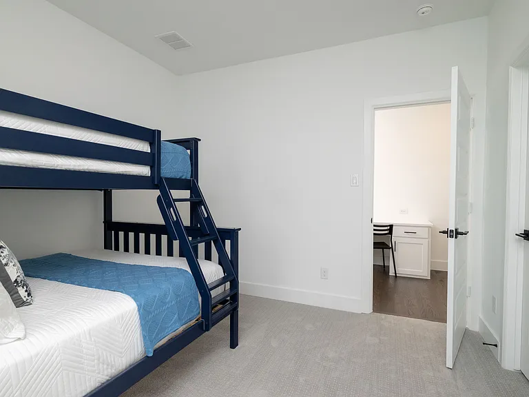 Bedroom #3 has a bunk bed w/ the bottom as a full size bed & top is a twin bed