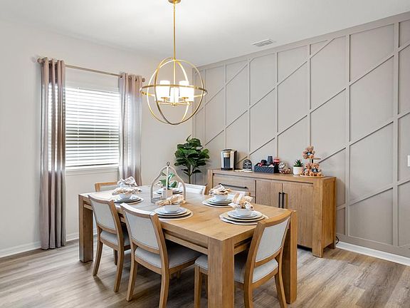 The designated dining area is the perfect spot for family dinners or hosting friends - Summerlyn ll