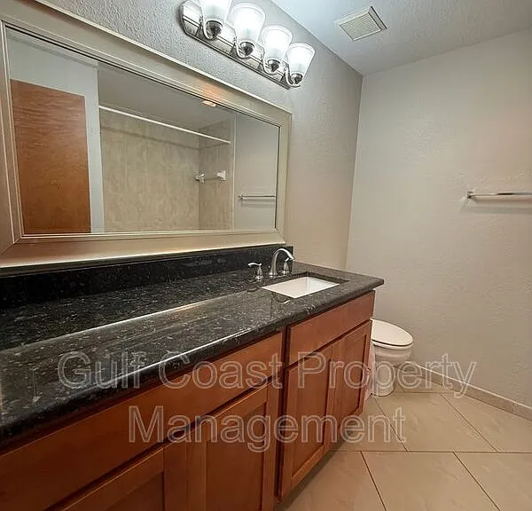 8555 Bernwood Cove Loop #103 — Photo 16