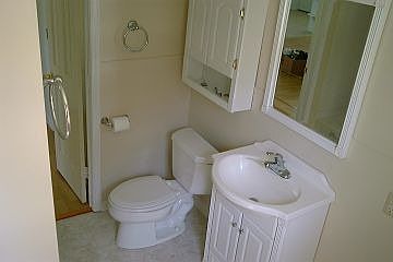 Cozy bath with Jack and Jill doors.