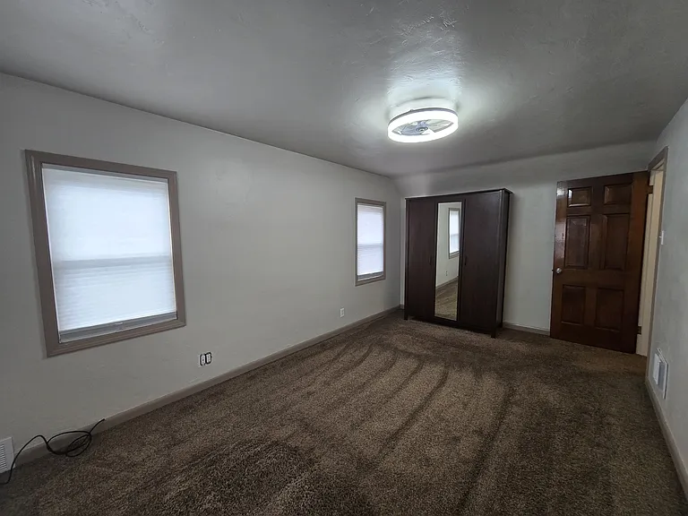 Master bedroom, with an armoire. Can be removed upon request.