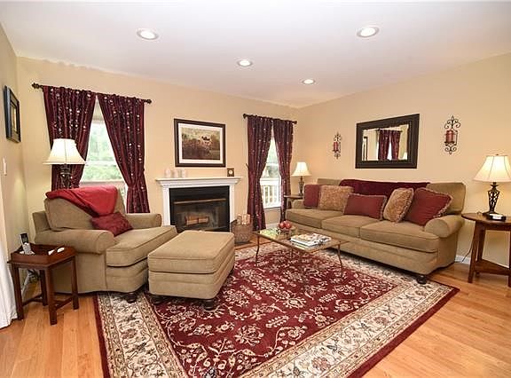 Formal living room.  Recessed lighting and hardwood floors.