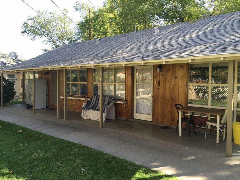Front of home with covered porch.