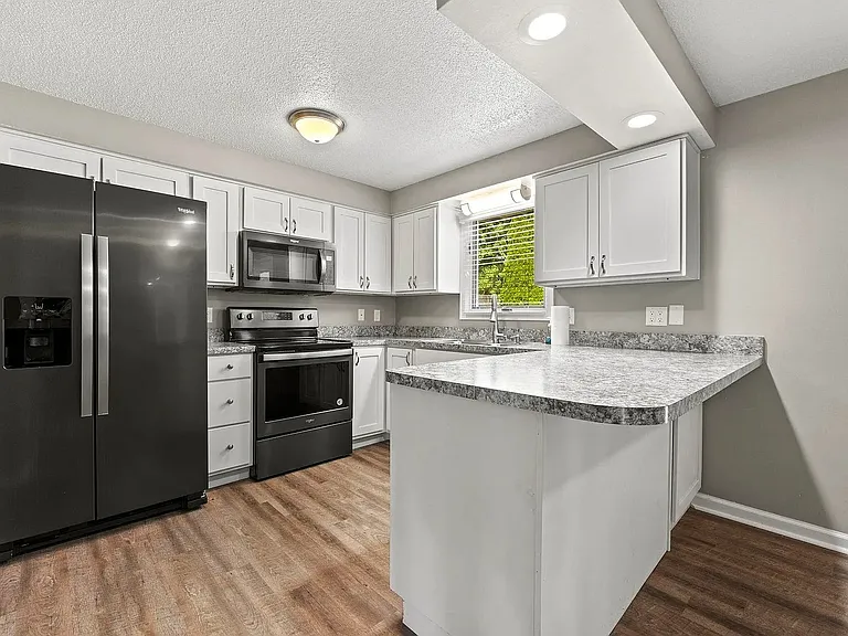 9210 Sea Wind Pl — Photo 4