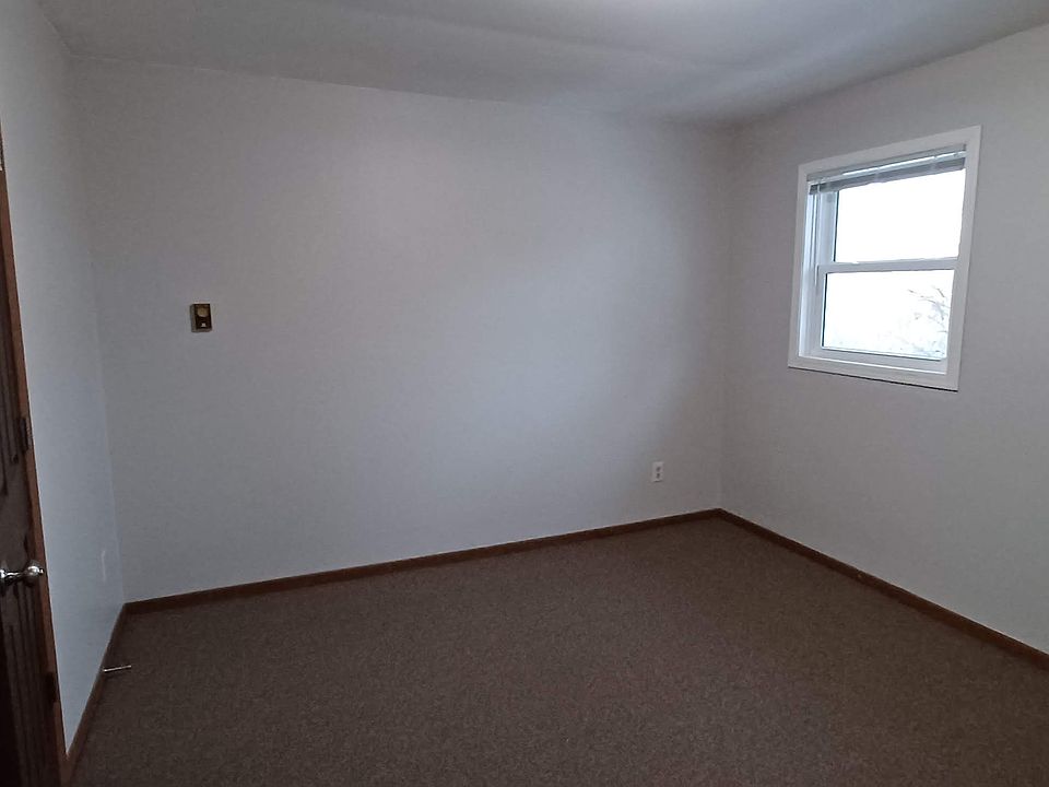 Bedroom 1. Adjacent to the bathroom.