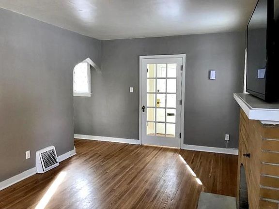 Living Room with plenty of light from French Door and Windows!