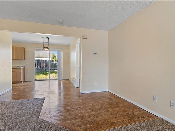 Hardwood floors and open floorplan.