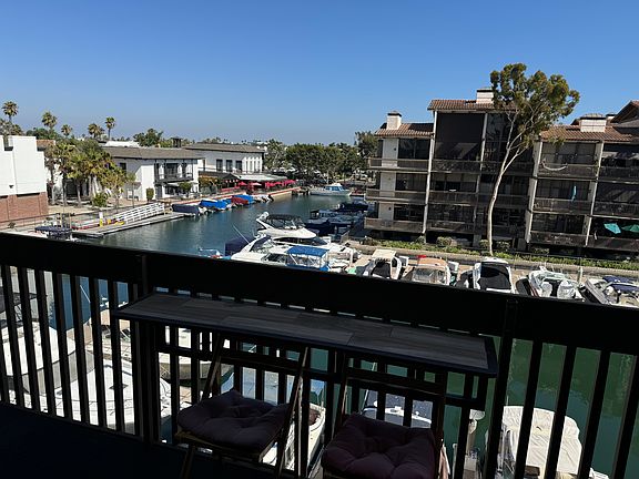 View of picturesque marina from you private top floor balcony!