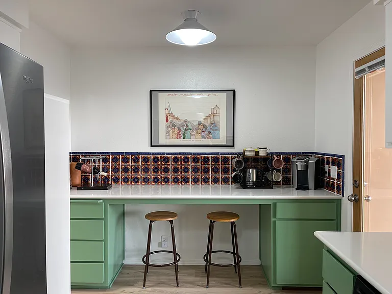 Kitchen breakfast bar with coffee, tea, and wine areas.