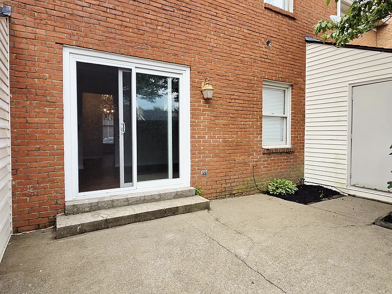 Back Patio with Storage Shed