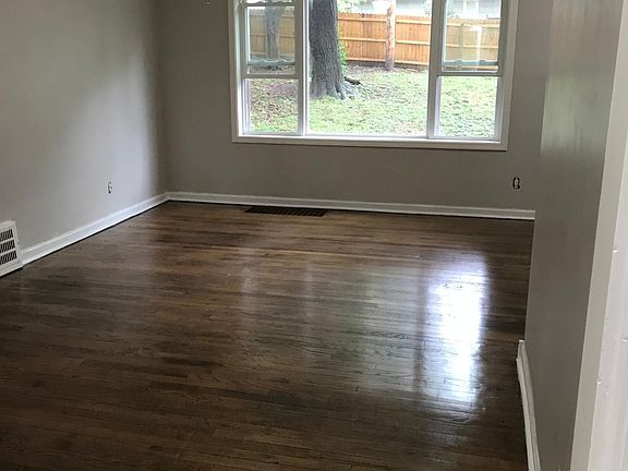 Large Living room with refinished hardwoods throughout!