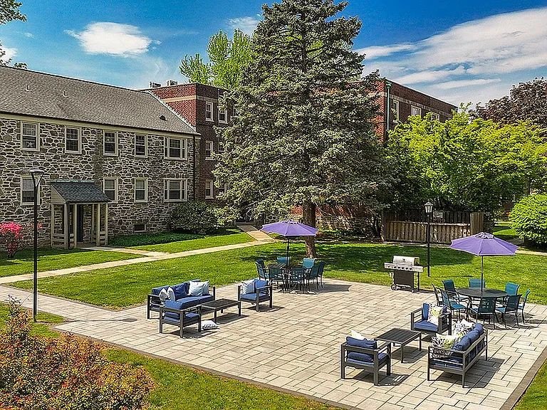 Patio area with seating and grill