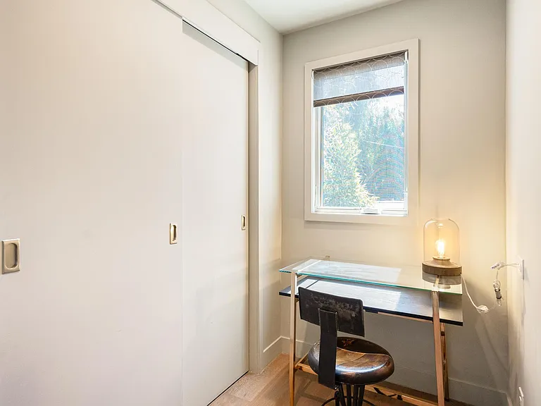 Dedicated workspace with a desk and privacy.