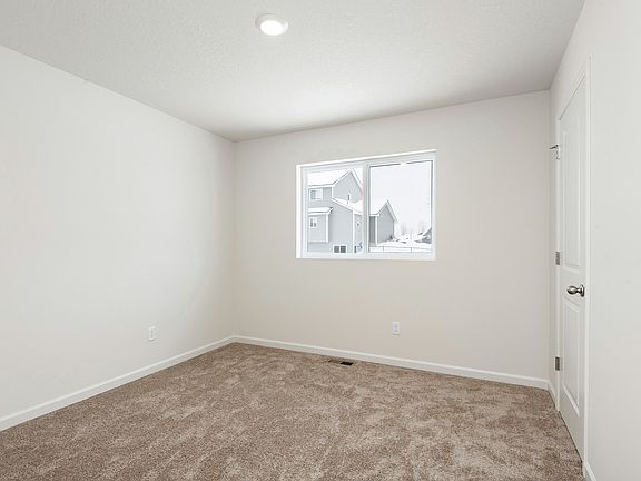 The master bedroom is spacious