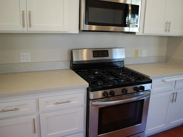 Kitchen (stainless steel appliances and quartz countertops)