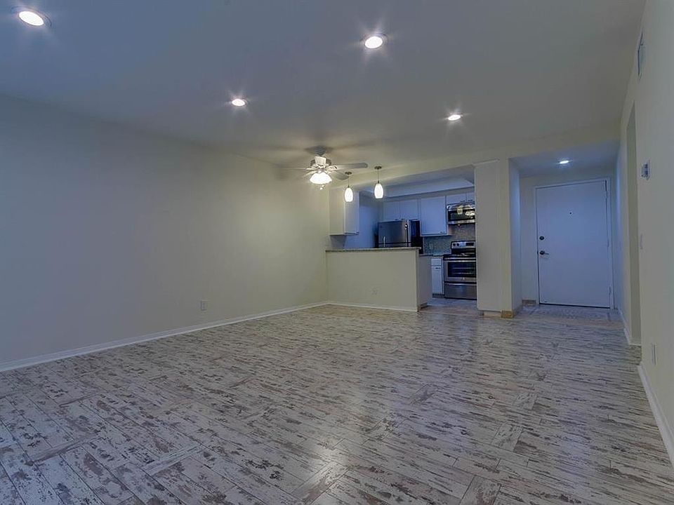 Big bright floorplan, custom flooring and lots of natural light and installed lighting