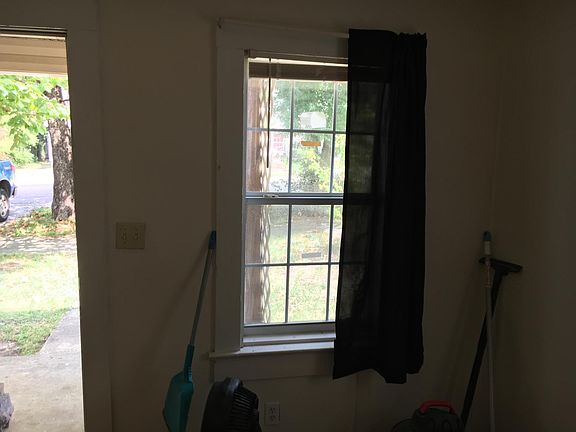 a view thru window and door to front yard