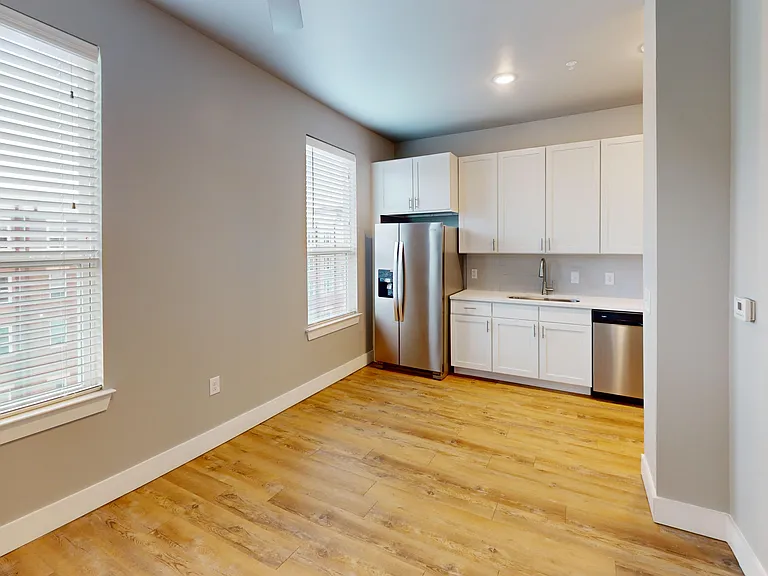 The Railyard studio apartment features a designated living space that flows to the kitchen. The Railyard studio apartment features a designated living space that flows to the kitchen.