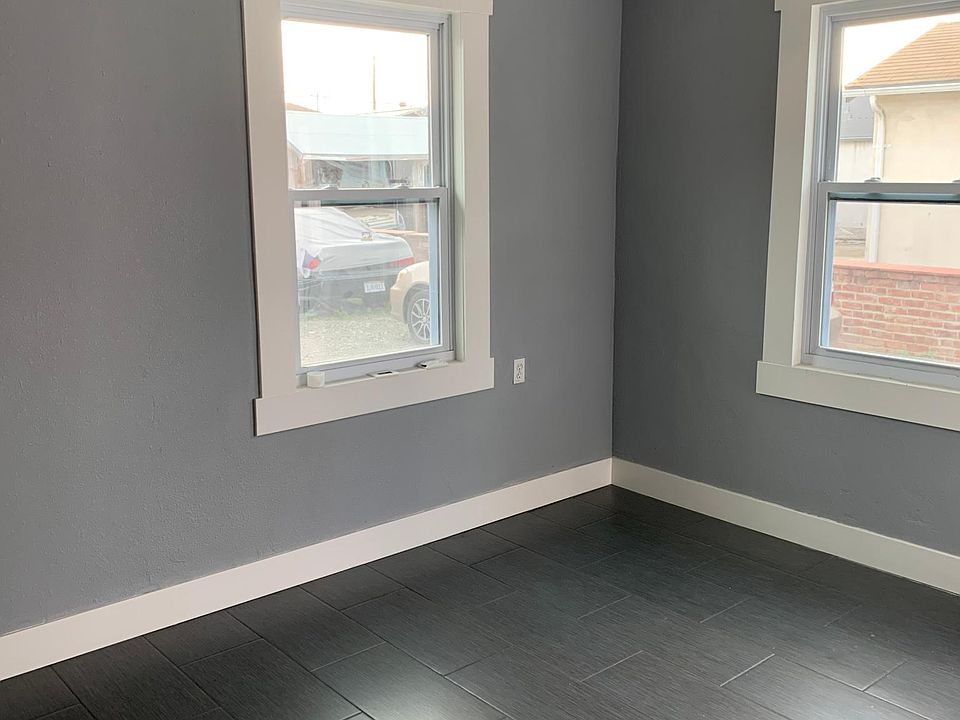 Living room with new paint & floors