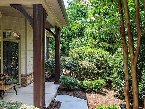 Private Side Entrance with lovely landscaping