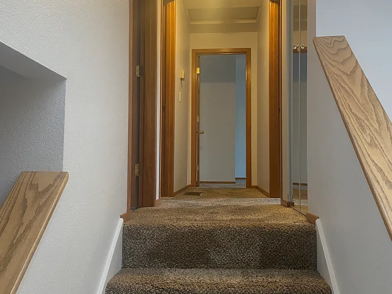 Few stairs up to 3 bedrooms/2 baths.
