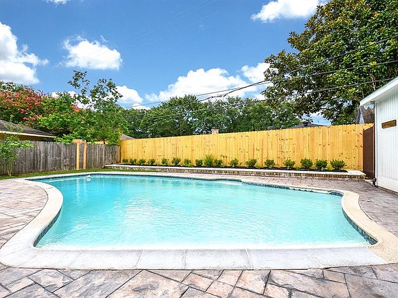 The irresistible backyard is truly amazing. Imagine yourself creating memories in this lovely pool!